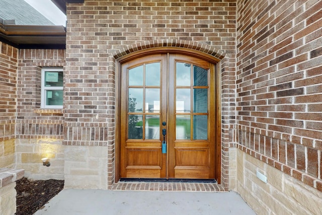 doorway to property with french doors