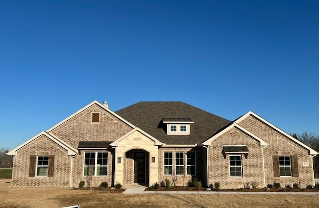 view of front facade with brick siding