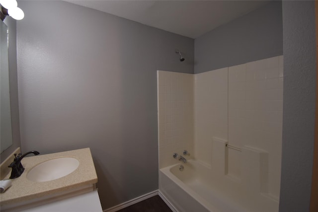 bathroom featuring vanity and tub / shower combination