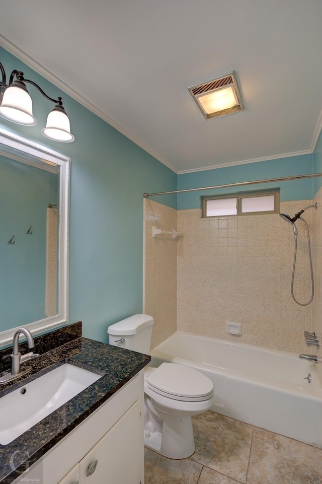 bathroom with toilet, vanity, visible vents, and crown molding