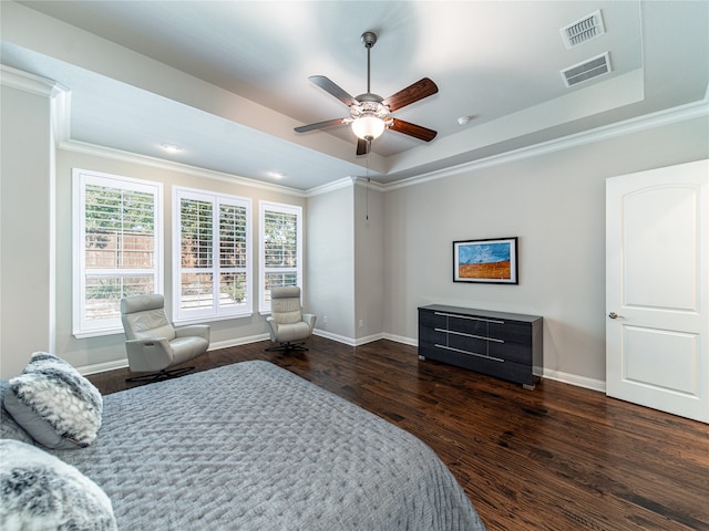 bedroom featuring ornamental molding, ceiling fan, and dark wood-type flooring