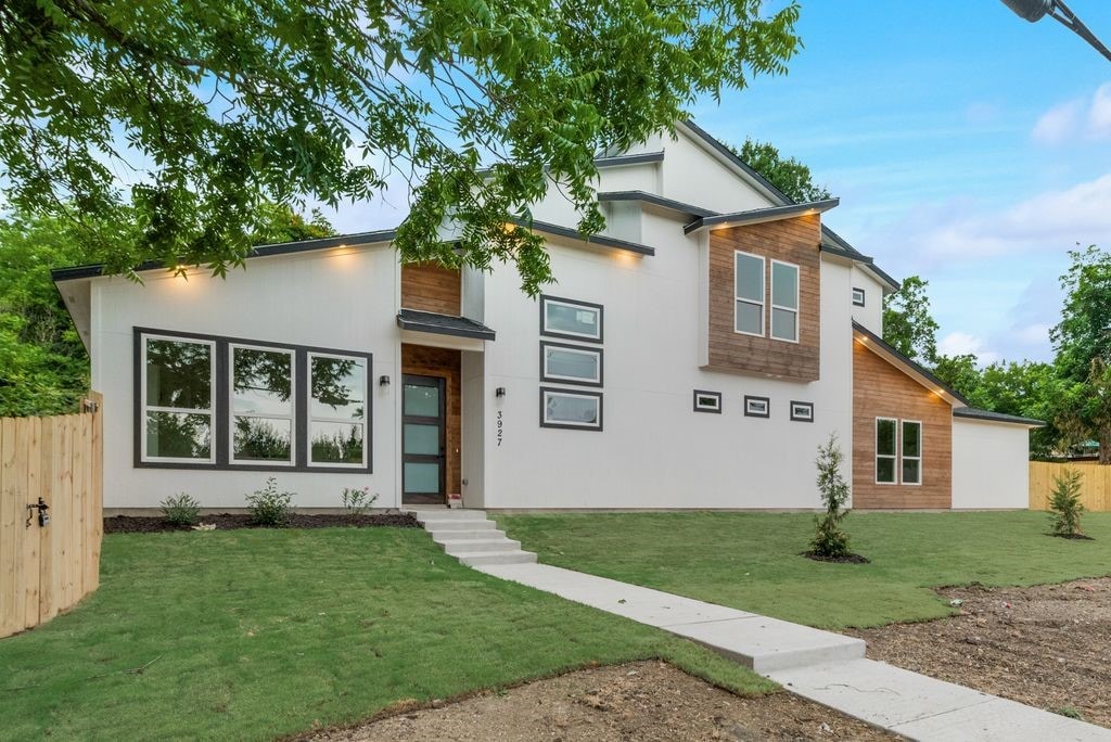 modern home with a front yard