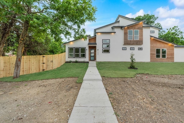 view of front of house with a front yard