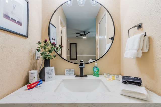 bathroom with vanity and ceiling fan