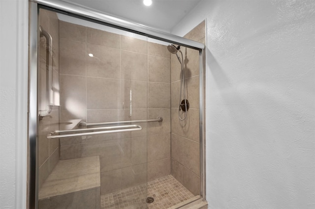 bathroom featuring walk in shower