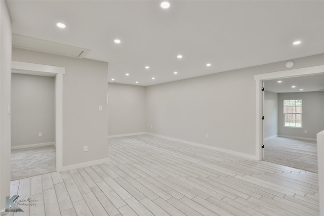 unfurnished room featuring light hardwood / wood-style flooring