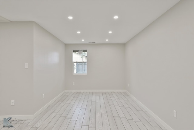 unfurnished room featuring light hardwood / wood-style flooring