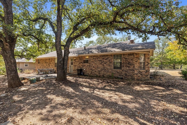 back of house featuring a patio