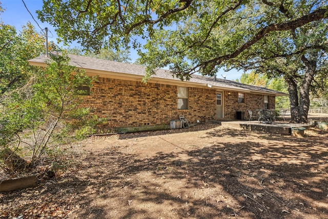 back of house with a patio area