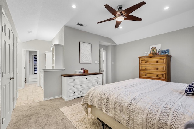 bedroom featuring lofted ceiling, light carpet, and ceiling fan