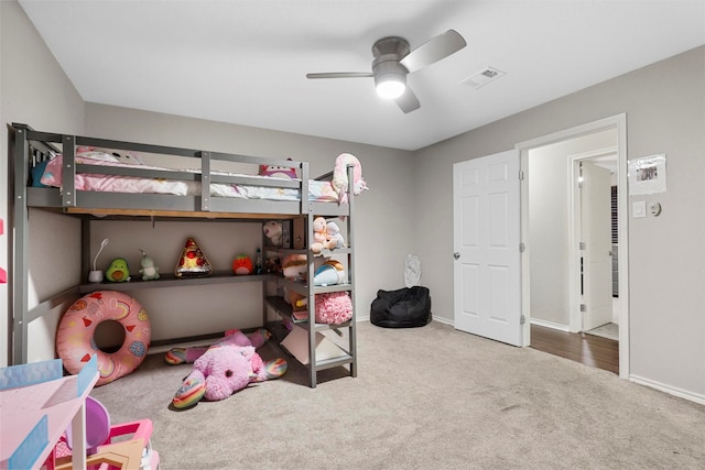 carpeted bedroom featuring ceiling fan