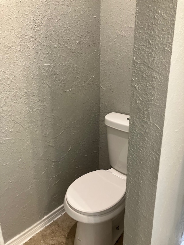 bathroom featuring toilet