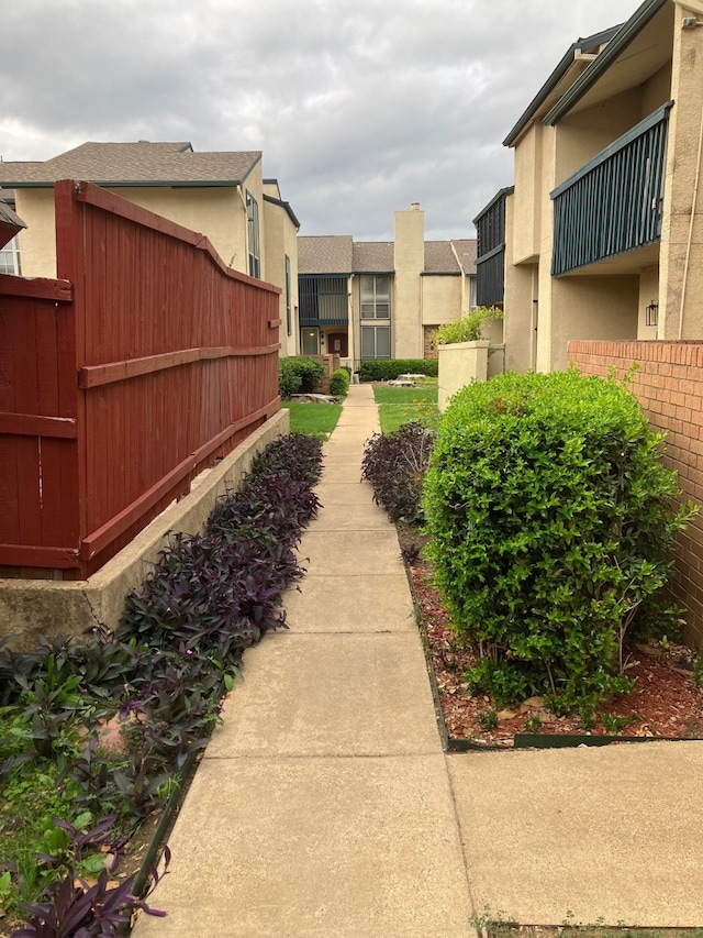 view of yard featuring a balcony