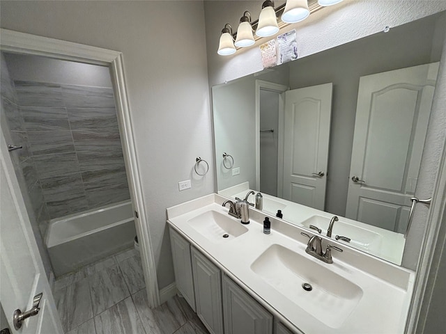 bathroom with vanity and shower / bathtub combination