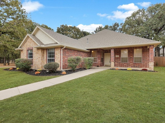 ranch-style house with a front lawn