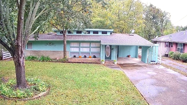 view of front of house with a carport, central air condition unit, and a front lawn