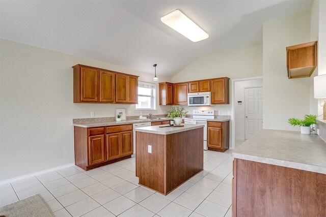 kitchen featuring kitchen peninsula, light tile patterned floors, decorative light fixtures, white appliances, and vaulted ceiling