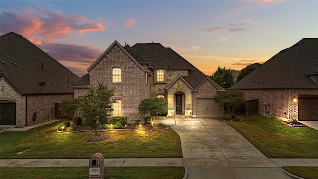 view of front of home with a lawn