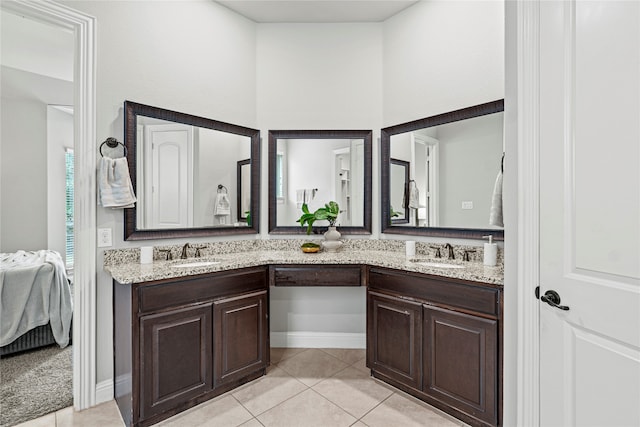 bathroom with vanity and tile patterned floors