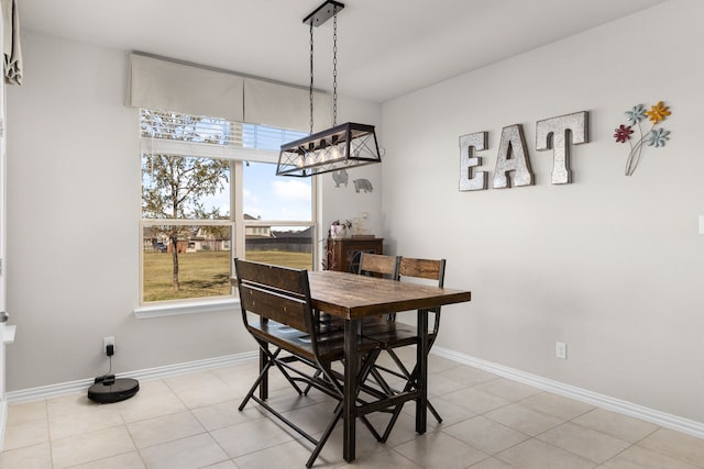 dining space with light tile patterned floors