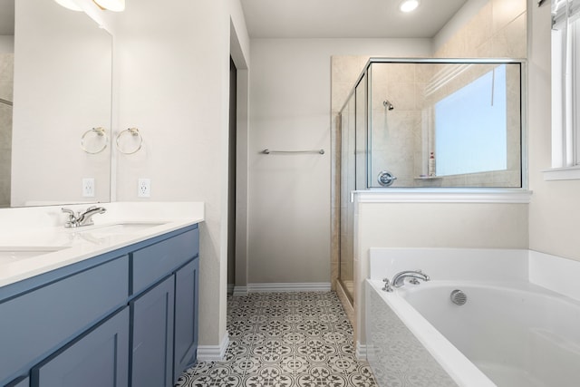 bathroom with vanity, tile patterned floors, and separate shower and tub