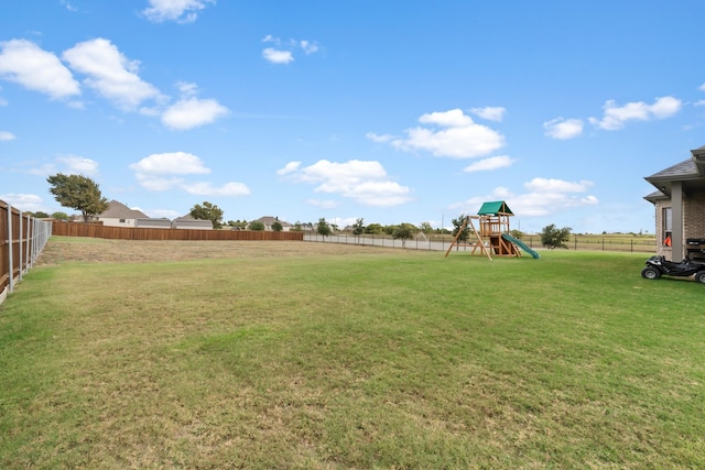 view of yard featuring a playground