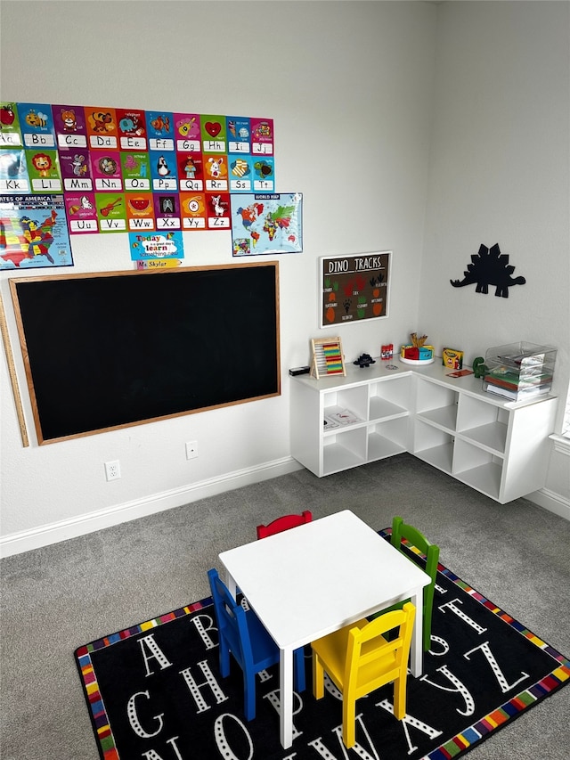 recreation room featuring carpet flooring