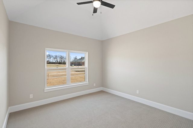 empty room featuring carpet and ceiling fan