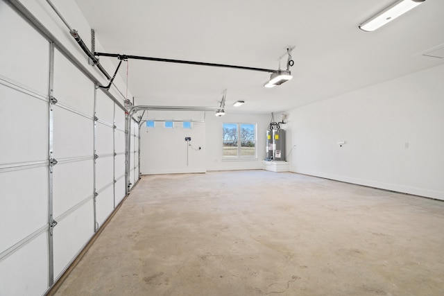 garage with a garage door opener and gas water heater