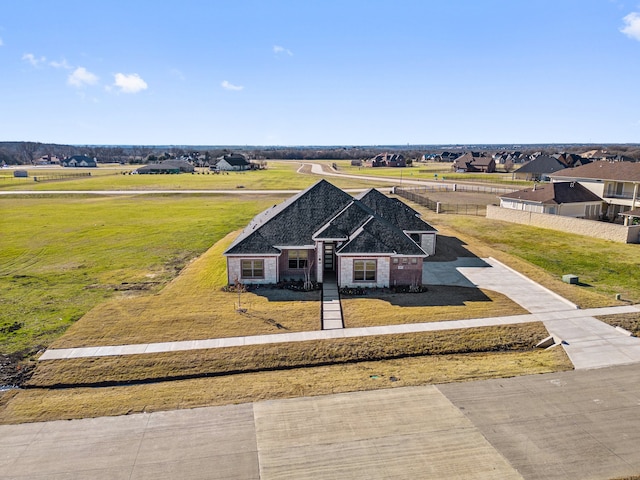 view of front of home with a front yard