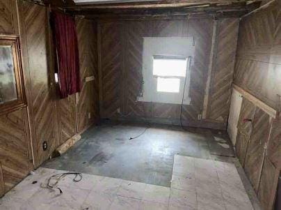 11114 E State Highway 31, Kerens, TX 75144 - miscellaneous room with wooden walls