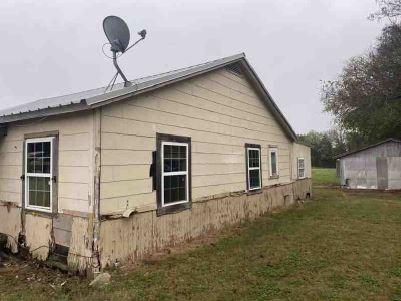 11114 E State Highway 31, Kerens, TX 75144 - view of home's exterior featuring a yard
