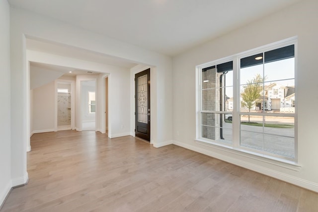 unfurnished room featuring light hardwood / wood-style flooring