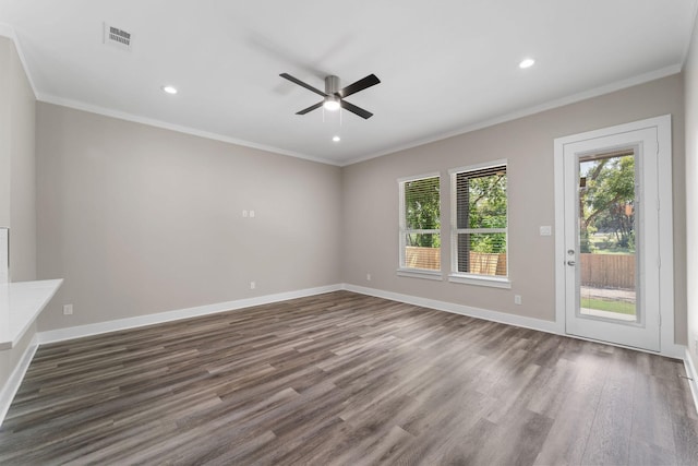 interior space featuring dark hardwood / wood-style floors, ceiling fan, and crown molding