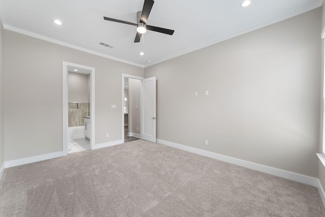 unfurnished bedroom with ensuite bath, ceiling fan, crown molding, and light carpet