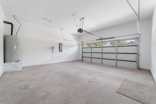 garage featuring electric panel and a garage door opener