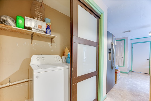 laundry room with washer / clothes dryer