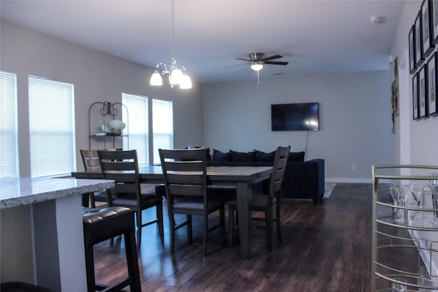 3910 Copeland St, Dallas, TX 75210 - dining space featuring a ceiling fan, dark wood-style flooring, and a chandelier