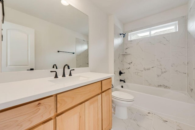 full bathroom with shower / washtub combination, marble finish floor, vanity, and toilet