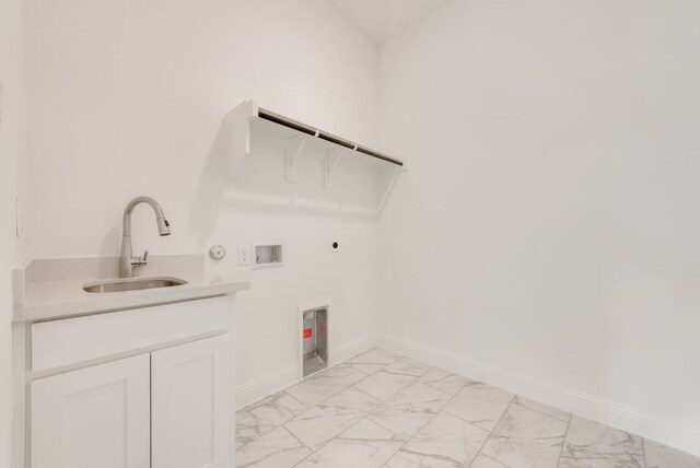 clothes washing area featuring hookup for a washing machine, a sink, baseboards, marble finish floor, and electric dryer hookup