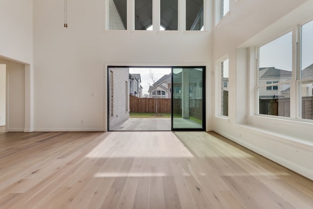 interior space featuring a wealth of natural light and wood finished floors