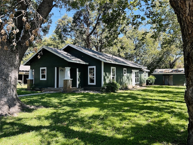 view of front of property with a front lawn