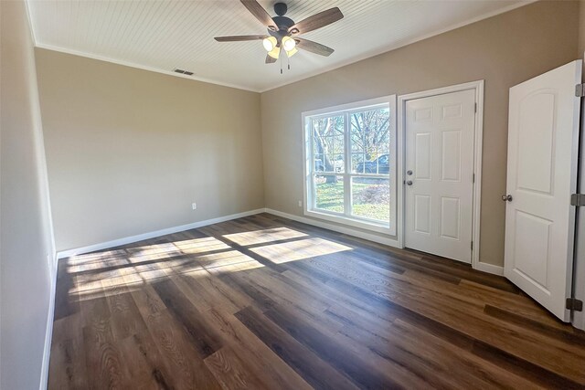 interior space with dark hardwood / wood-style flooring, ceiling fan, and crown molding