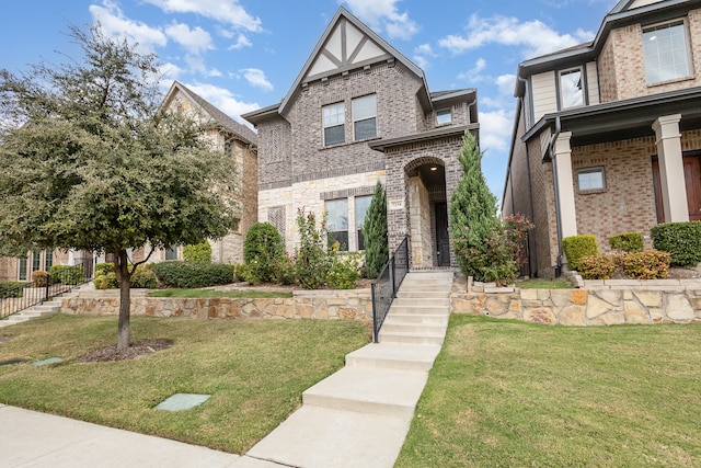 view of front of home with a front lawn