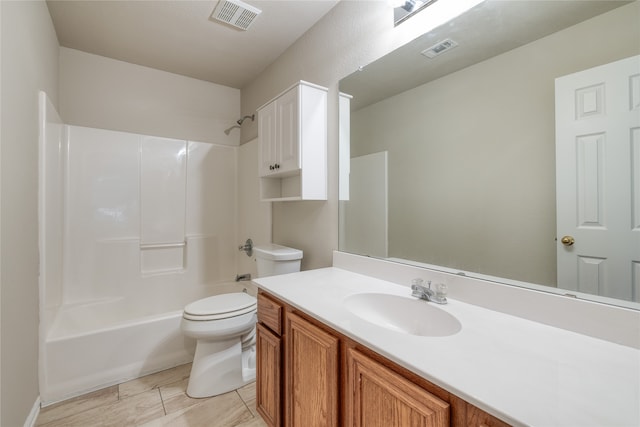 full bathroom featuring vanity, toilet, and bathtub / shower combination