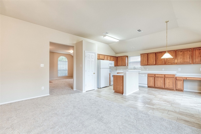 kitchen with white appliances, a center island, light colored carpet, pendant lighting, and vaulted ceiling