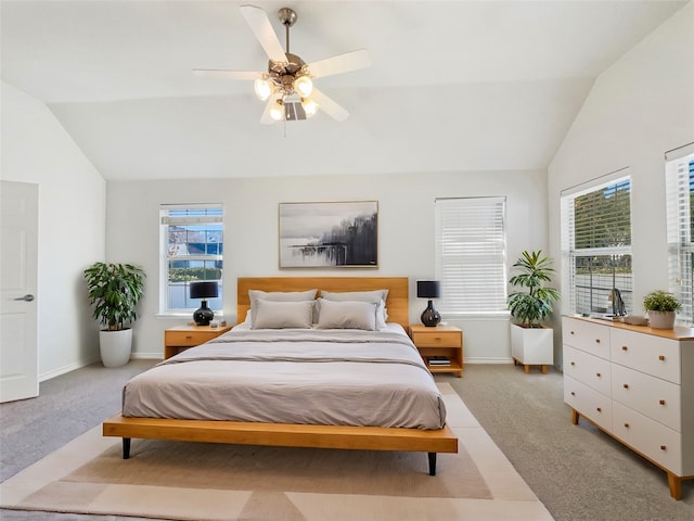 carpeted bedroom with lofted ceiling and ceiling fan