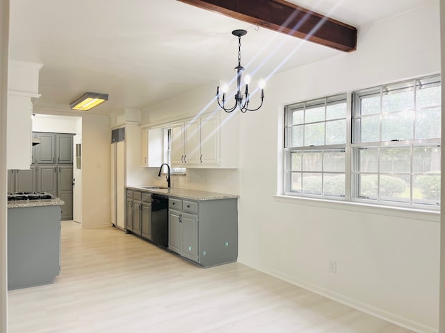 kitchen with dishwasher, light hardwood / wood-style flooring, sink, decorative light fixtures, and white cabinetry