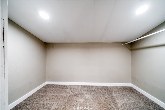 walk in closet featuring carpet floors