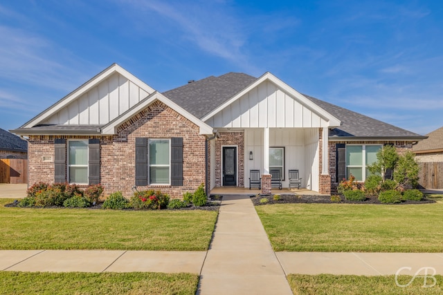 view of front of home with a front lawn